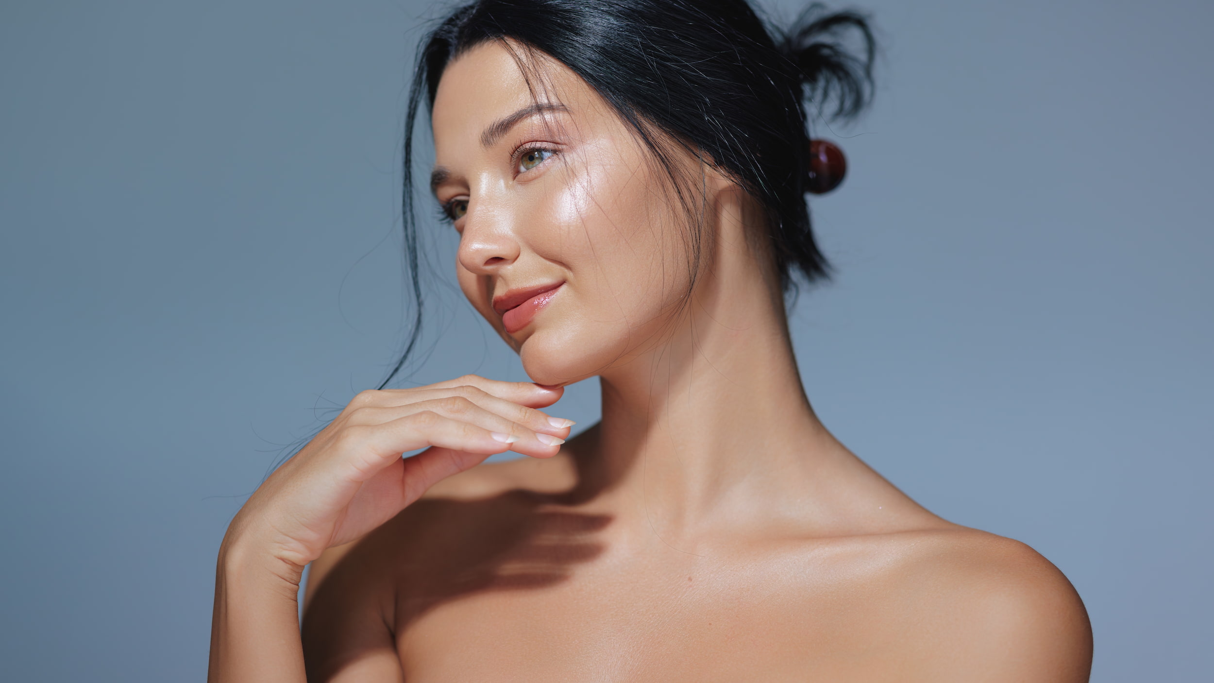 A woman following a skincare treatment in Wimbledon.